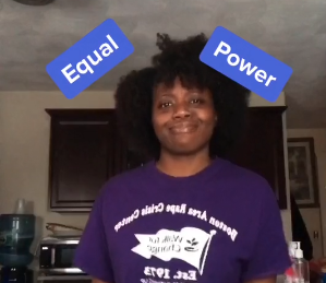 Screenshot of a BARCC Youth Leadership Corps member TikTok video, looking at camera with words Equal and Power above their head.