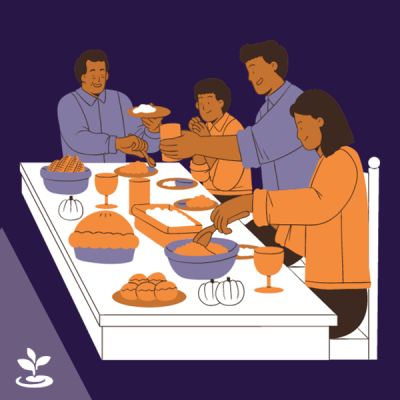 Family sitting at festive table